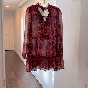 Fun dress for any occasion. Long sleeved, mini sheer lots of detail. Worn once.